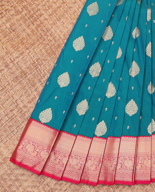 Blue Budget Silk Saree, Beautifully Bedecked with Zari Buttas All Over Its Body, Complemented by a Contrast Traditional Zari Design Border, Intricately Designed Pallu, and Paired with a Contrast Blouse