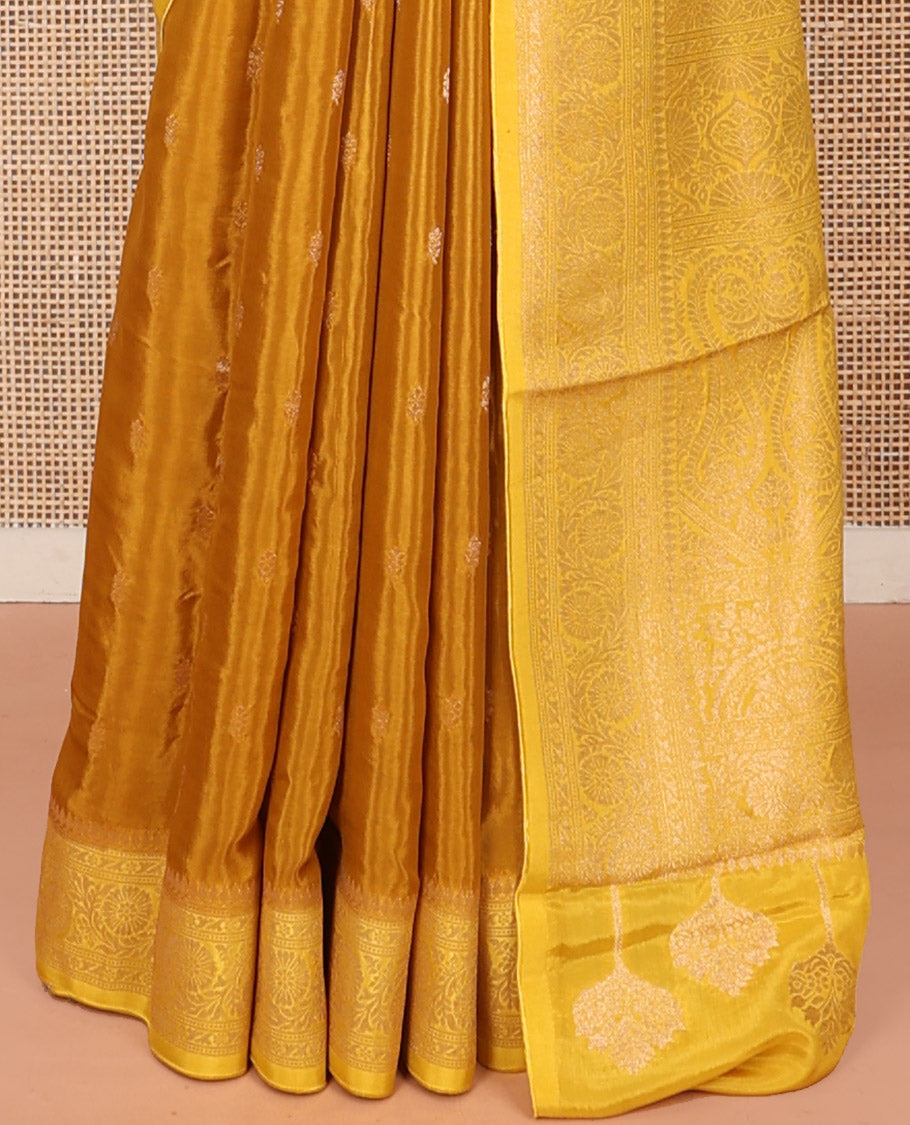 Mustard Fancy Crepe Saree, Adorned with Buttas, Complemented by a Contrast Floral Creeper Border, Intricately Designed Pallu, and a Contrast Blouse