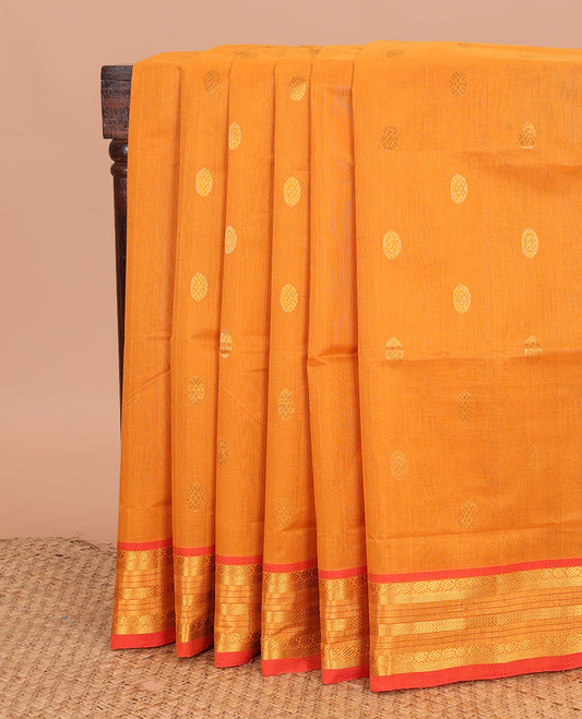 Orange chakram buttas Venkatagiri cotton saree, contrast traditional zari border, and zari striped pallu