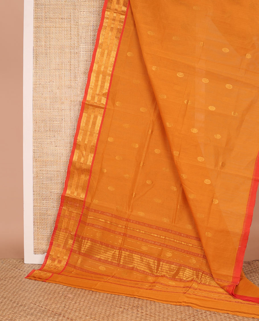 Orange chakram buttas Venkatagiri cotton saree, contrast traditional zari border, and zari striped pallu