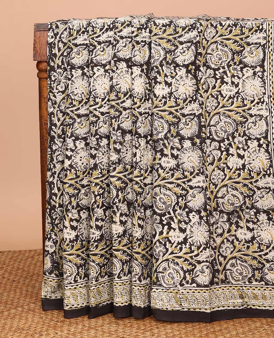 Black floral vine machine-printed Kalamkari cotton saree, geometric printed border, and pallu of floral print
