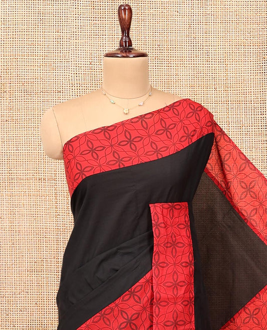 Black Plain Poly Cotton Saree, Complemented by a Contrast Jaal-Printed Border, Pallu, and a Contrast Blouse