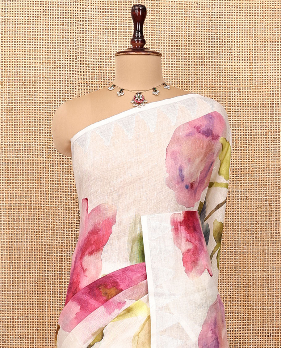 Cream-Base Linen Saree, Highlighted by Floral-Themed Paint Splashes, Hand-Brush Painted All Over Its Body, Sparsely Woven Temple Border, and Paired with a Matching Blouse