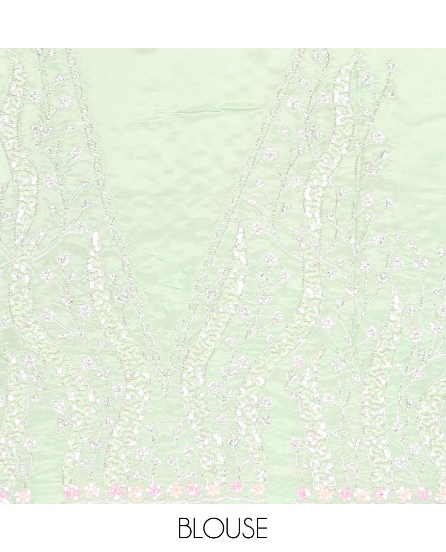Light pistachio green embroidered designer saree with scallop embroidered border