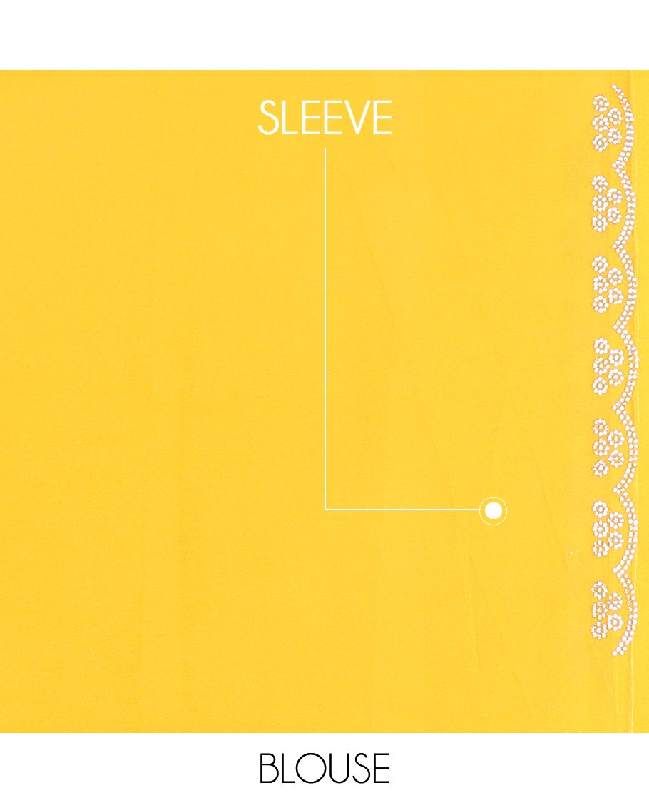 Yellow Swarovski stone embroidered designer saree with stones embedded in its body, a flower-shaped stone aligned scallop border