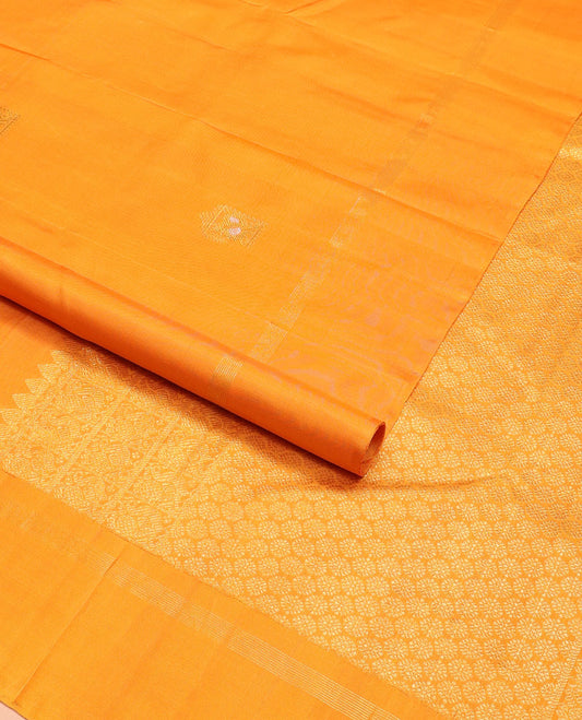 Borderless yellow zari mayil buttas Kanchipuram silk saree, self-pallu steeped with mayil & chakram motifs