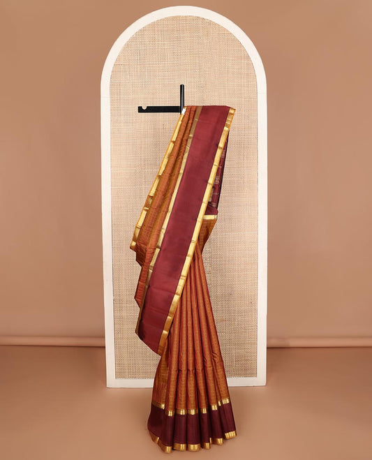 Honey color muthu kattam Kanchipuram silk saree, contrast rettai pettu border of muthu designs, and zari design pallu