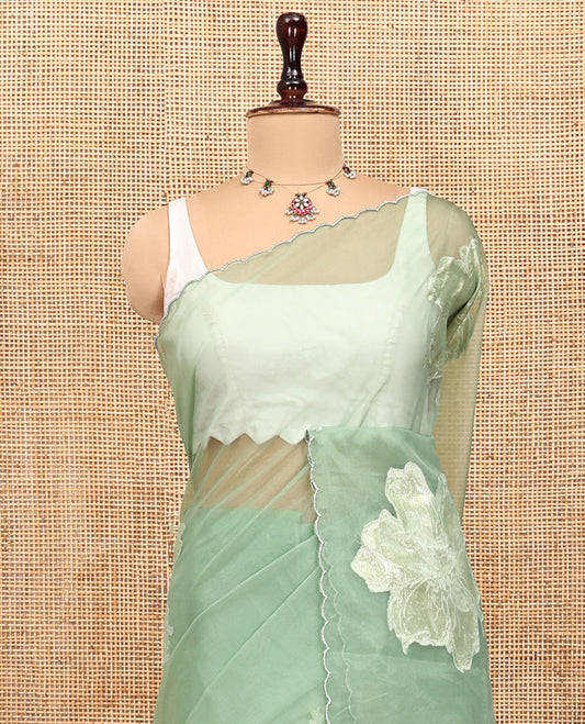 Green Organza Saree, Gracefully Embellished with Floral Gold-Foil Embroidery, a Scallop Border, and a Matching Blouse
