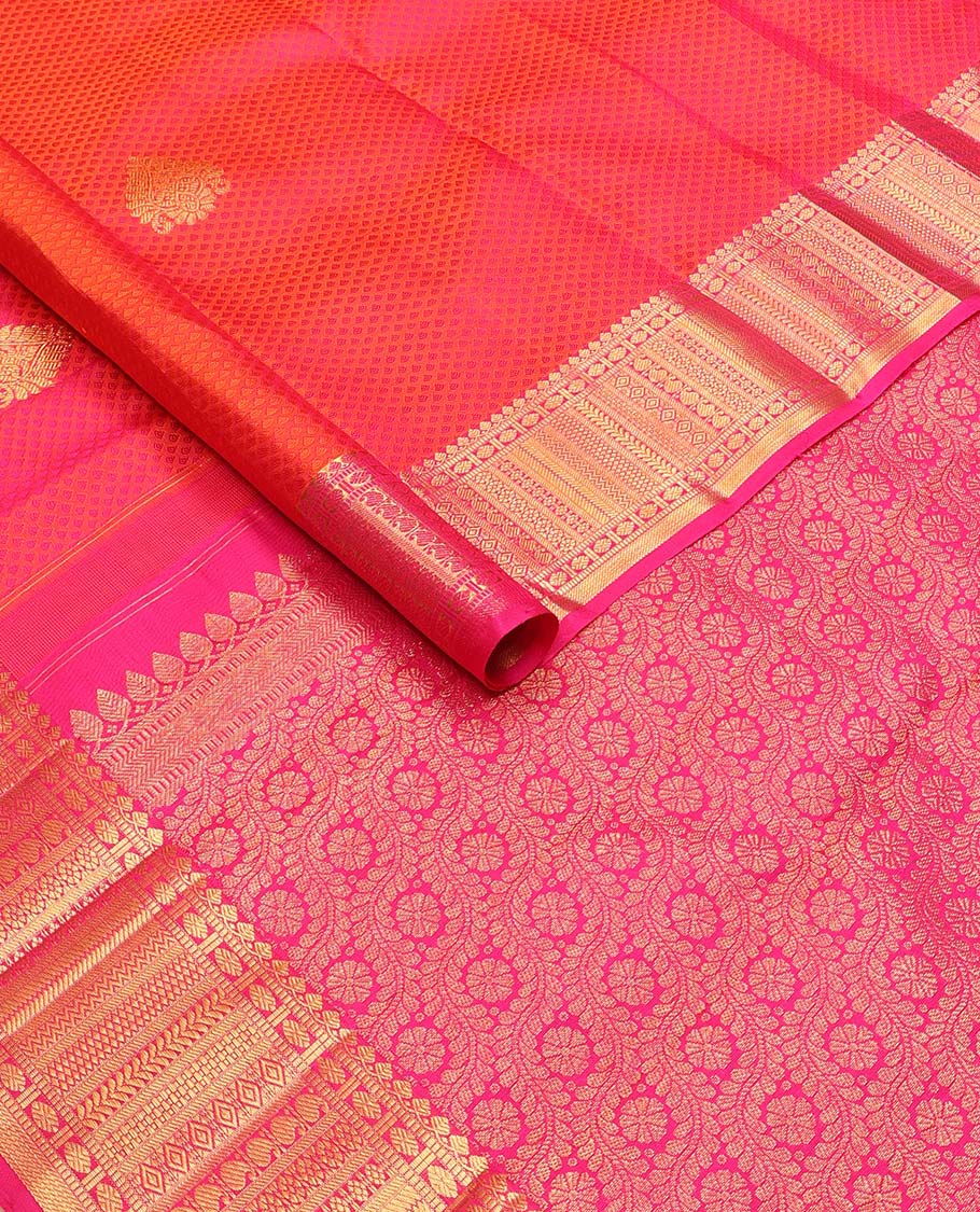 Red floral design silk saree with contrast border of thilakam mokku, muthu, manga, poo chakram design & floral design pallu