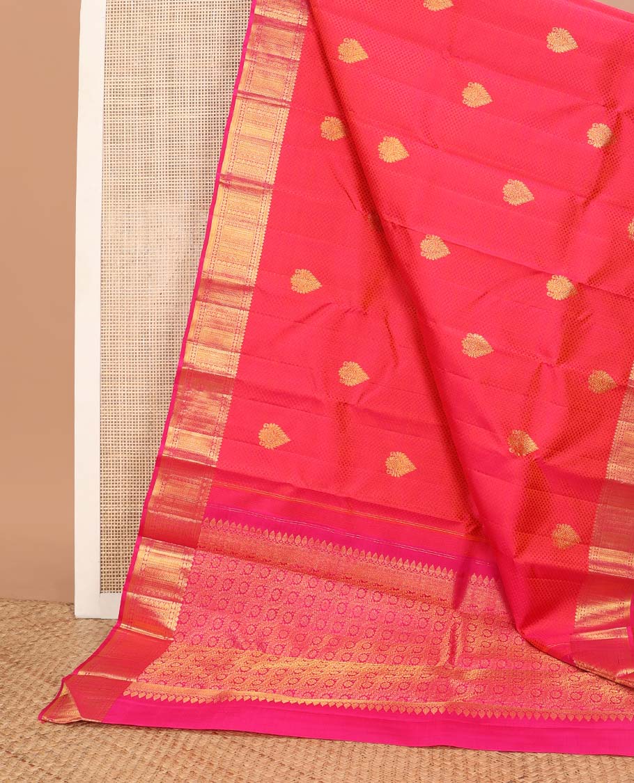 Red floral design silk saree with contrast border of thilakam mokku, muthu, manga, poo chakram design & floral design pallu