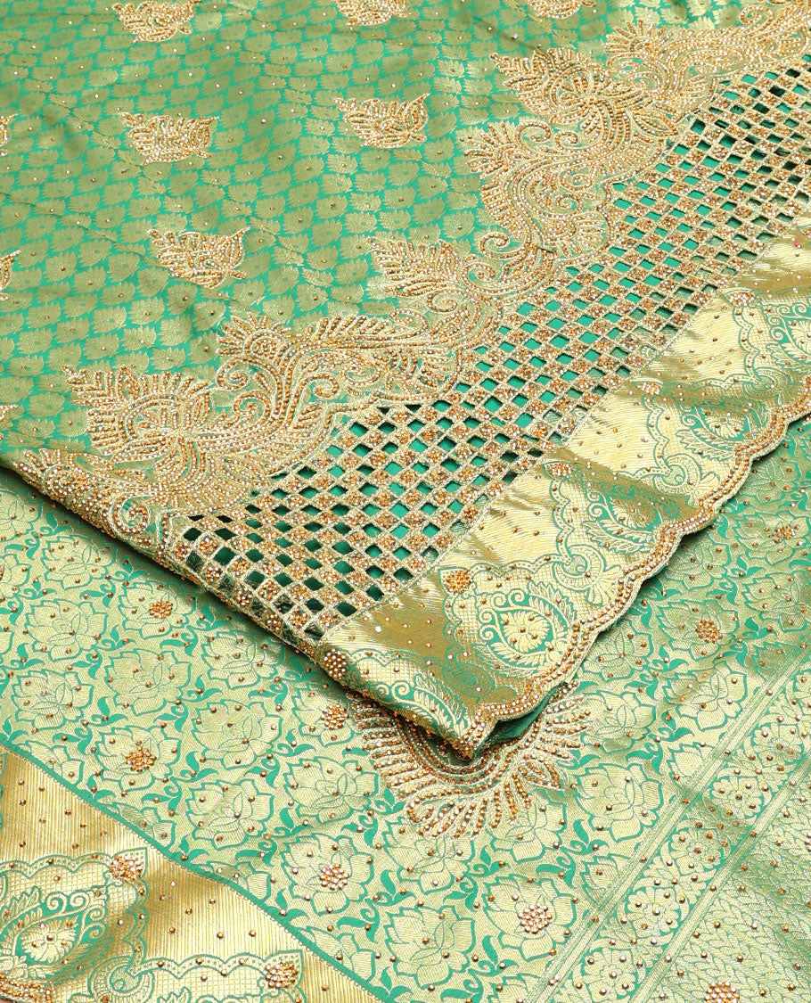 Green jacquard stone embroidered silk saree, stone embroidered scallop zari design cut work border & zari woven & stone embroidered pallu