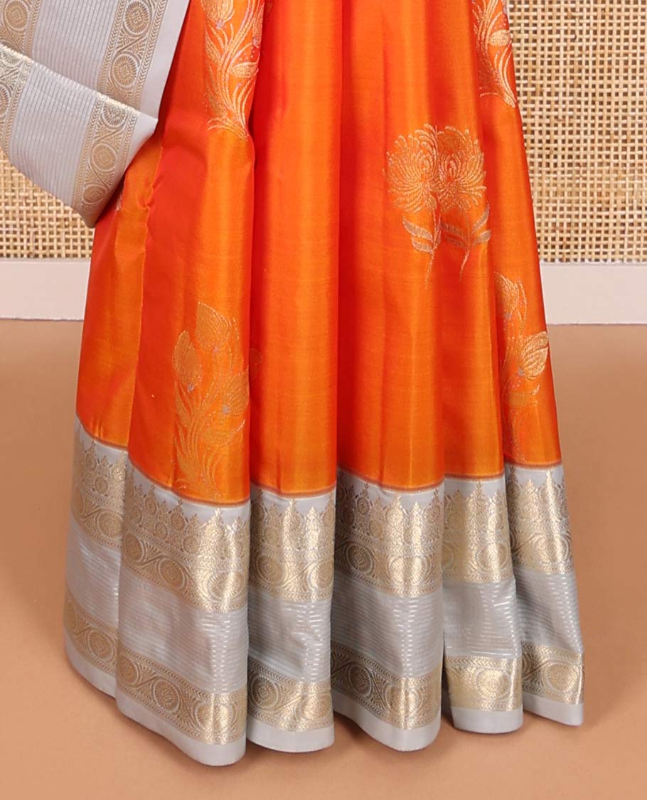 Orange flower motifs vasundhara elite silk saree with contrast inricate zari design border & floral design pallu