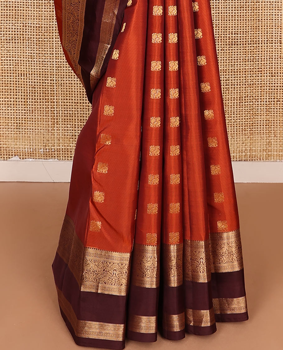 Rust Orange Vasundhara Lite-Silk Mix Saree Showcasing Mayil Buttas, Complemented with a Contrast Rettai Pettu Border Featuring Muthu, Diamond, and Mayil Designs, Adorned with Jaal Pallu, and a Contrast Blouse
