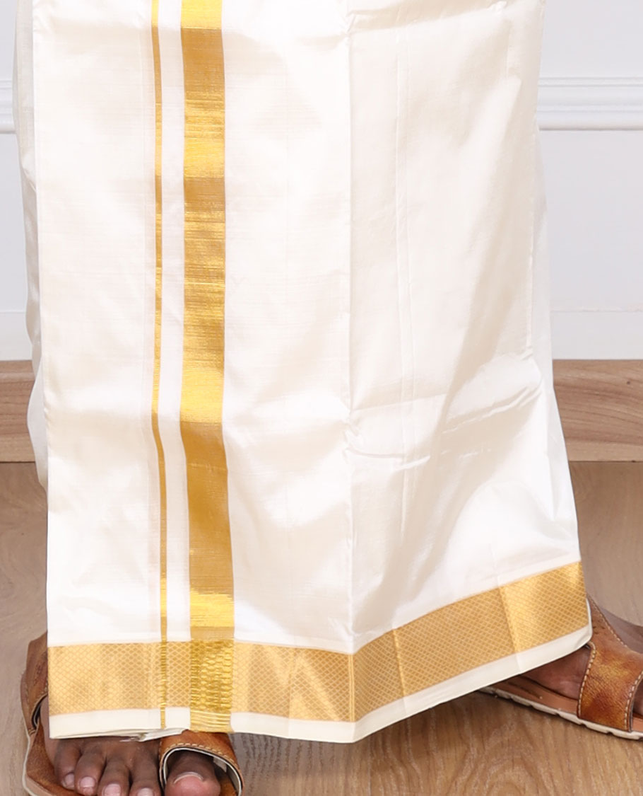 Cream pure silk kancheepuram wedding double-layer dhoti with traditional kuyil kann zari border