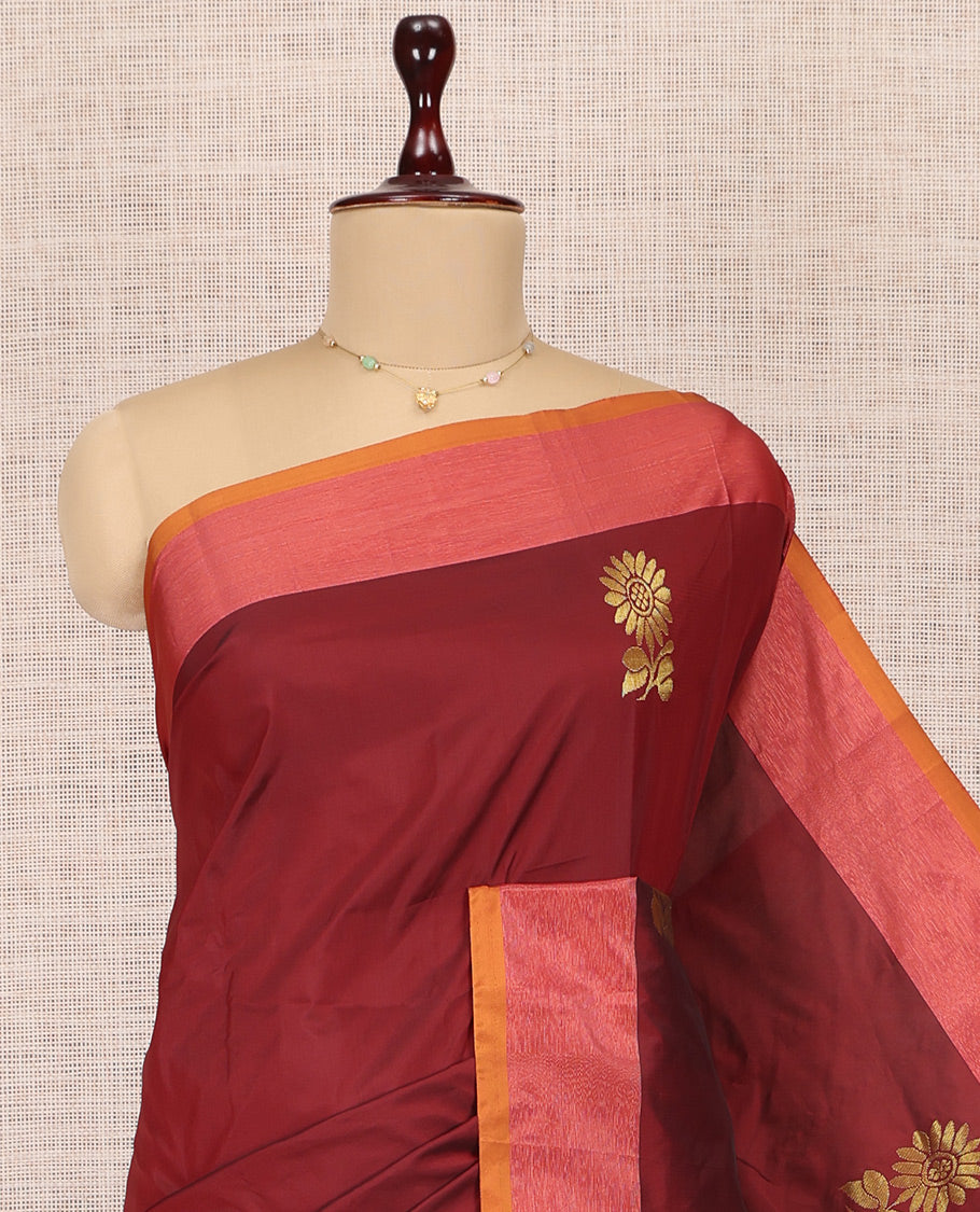 Maroon Arani Saree, Adorned with Floral Zari Buttas, a Contrast Border, Contrast Floral Buttas Pallu, and a Matching Blouse