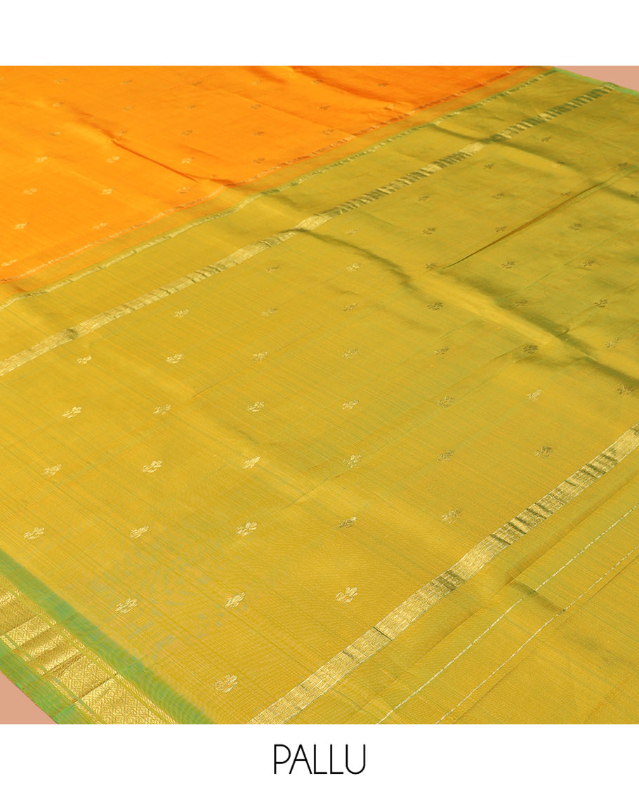 Orange Kanchipuram Silk Saree Featuring Zari Buttas, Complemented by a Contrast Border of Banaras and Mayil Kann Design, Pallu of Zari Design, and No Blouse
