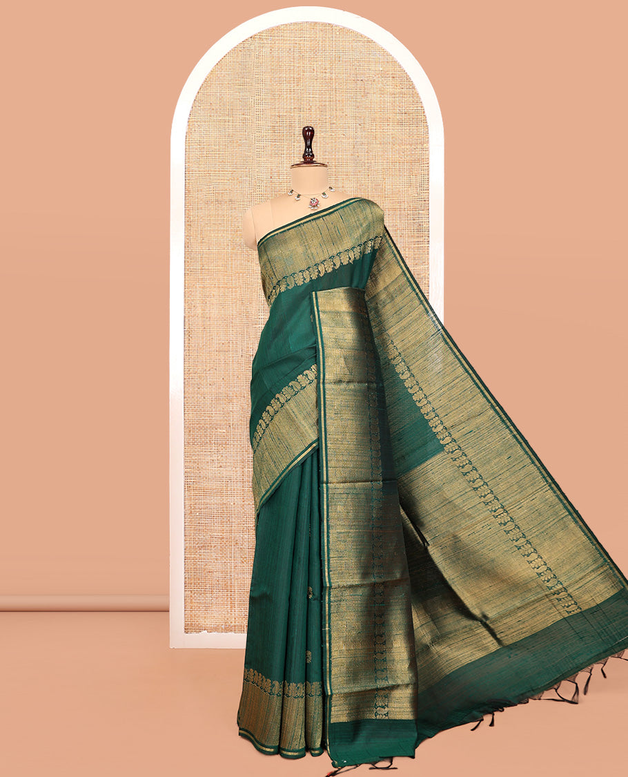 Green Dupion Silk Saree, Subtly Enriched with Buttas, a Traditional Border, Gleaming Zari Pallu, and a Matching Blouse