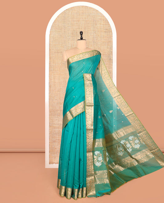 Green Silk Cotton Saree, Detailed with Buttas, Complemented by Contrast Floral Creeper Border, Pallu of Floral Designs, and Contrast Blouse