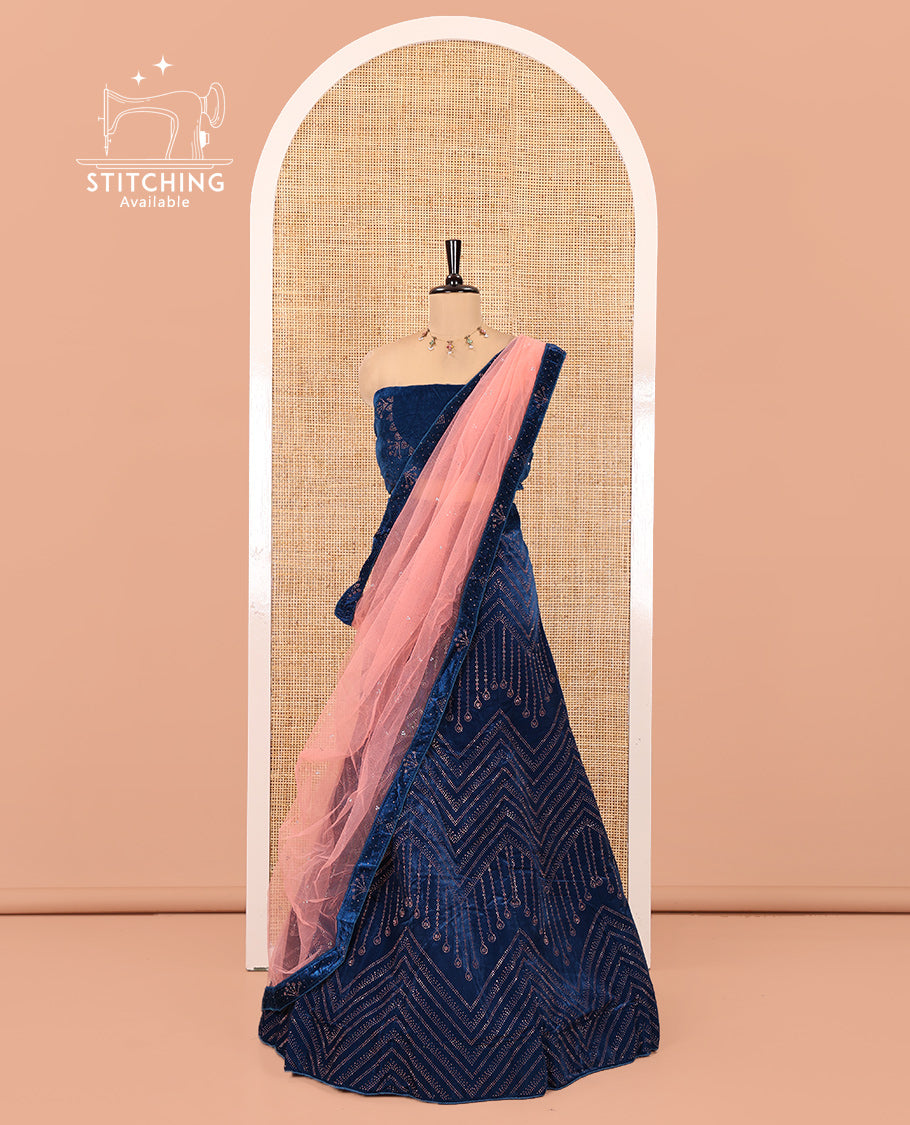 Blue Velvet Half-Saree, gleamed up with Swarovski Stonework Skirt, Matching Stonework Blouse, and Net Stonework Dhavani
