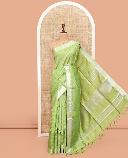 Light Green Banana Pith Saree, Lightly Embellished with Buttas All Over Its Body, Highlighted by a Zari Temple Border, Gleaming Zari Striped Pallu, and Paired with a Matching Blouse