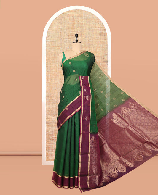 Green Cotton Saree, Enriched with Floral Buttas, a Contrast One-Side Big Floral Zari Butta Border, a Jaal Pallu, and a Contrast Blouse