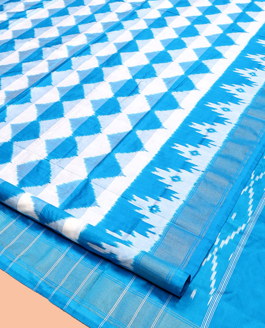 Blue Pochampally Ikat Silk Saree, Adorned with Triangle Motifs, Highlighted by a Self-Border, Ikat Jaal Pallu, and Matching Blouse