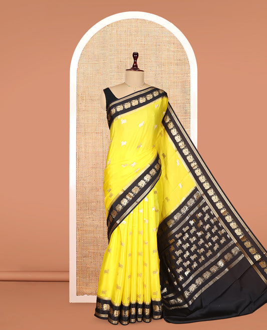 Yellow Mysore Silk Saree, Artfully Detailed with Pichwai Cow Buttas, Complemented by a Contrast Pichwai Cow Zari Border, Pallu Steeped with Pichwai Cows, and a Contrast Blouse