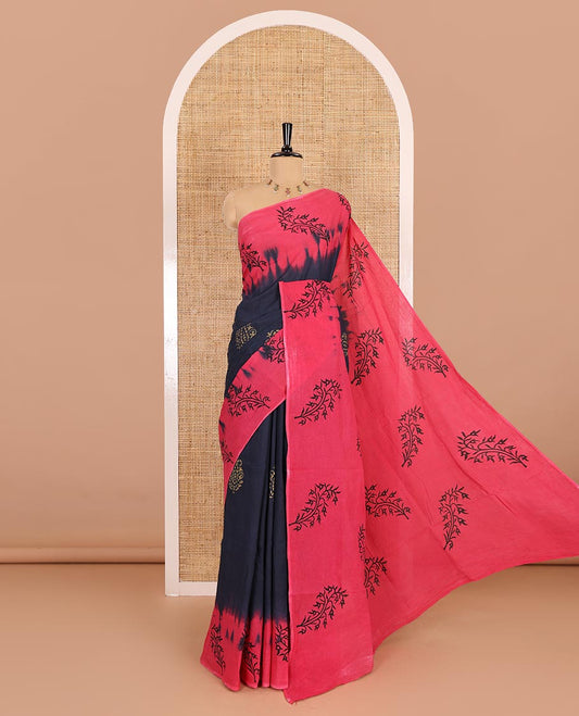 Navy blue paisley motifs block printed mul cotton saree, contrast leaf motifs block printed border, leaf motifs printed pallu, and contrast plain blouse