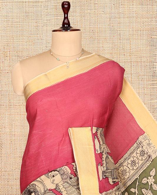Red Kalamkari Silk Saree, Gracefully Embellished with Ancient Human Motifs Print, a Contrast Traditional Zari Border, Pallu Features God and Goddess Designs, and a Contrast Blouse