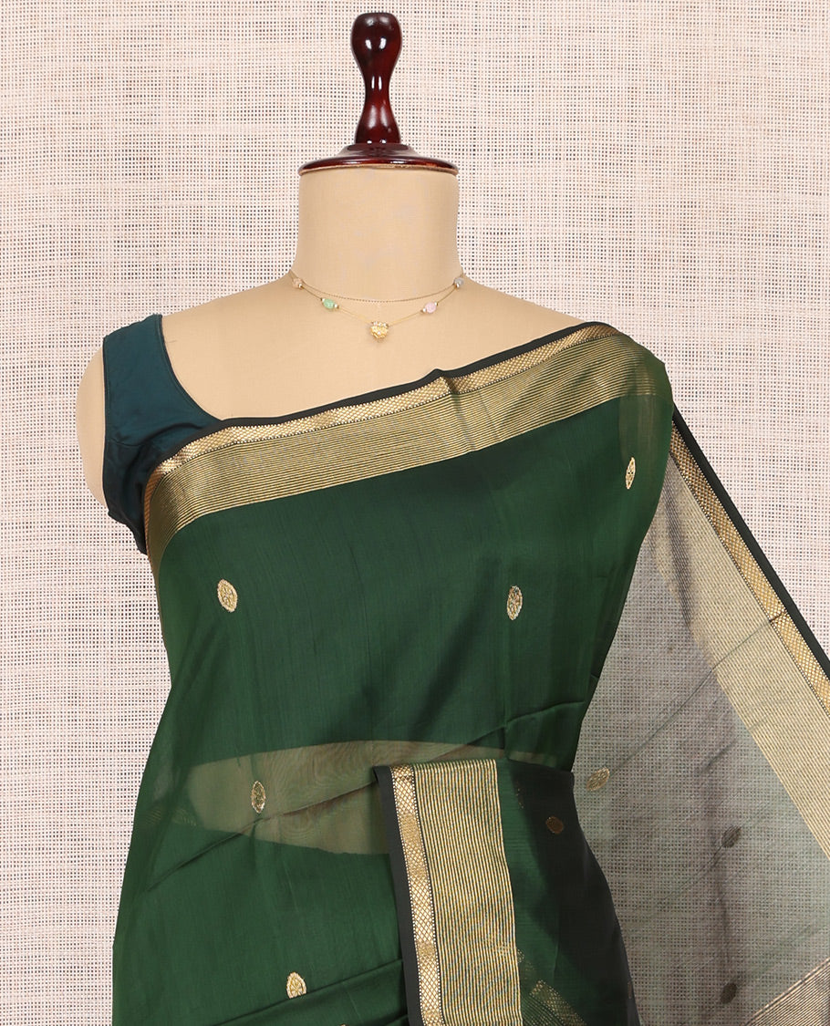 Green Maheshwari Cotton Saree, Accentuated with Buttas, a Contrast Traditional Zari Border, Gleaming Zari Woven Pallu, and a Matching Blouse