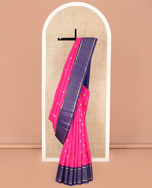 Pink Kanchipuram Silk Saree, Decked Up with Zari Buttas on Its Body, Complemented by a Contrast One-Sided Korvai Border of Thilakam Mokku, and Banaras Designs, Pallu Steeped with Kamalam Zari Designs, and Comes Without a Blouse