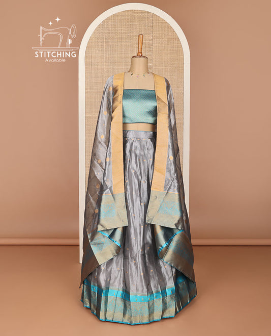 Grey floral jaal design half saree with contrast zari design border , checked zari design blouse & floral zari design dhavani