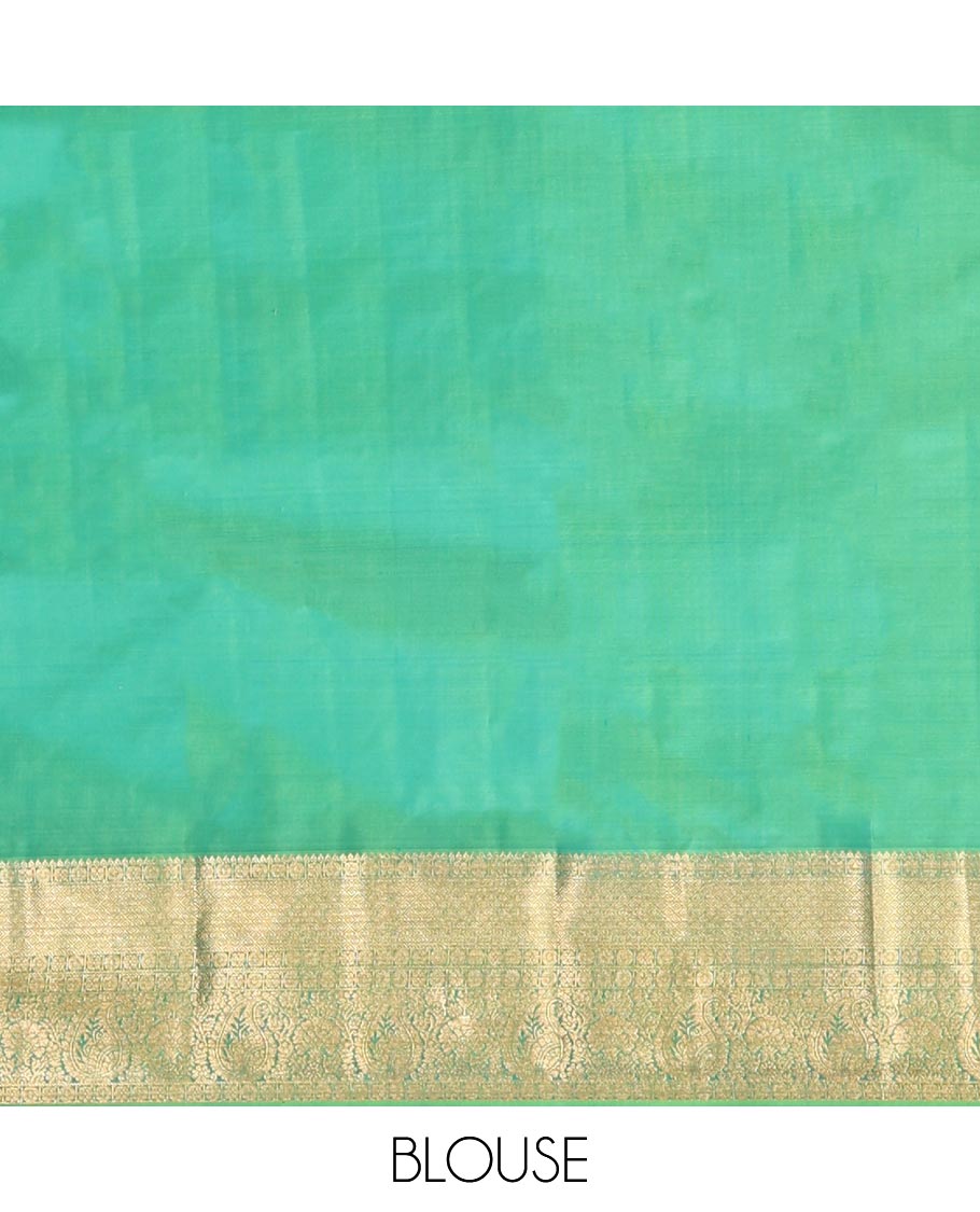 Green Kanchipuram Wedding Silk Saree, Elegantly Highlighted with Meenakari Jacquard on Its Body, Highlighted by a Zari Border of Jaal, and Arumbu Manga Designs, Grand Jaal Pallu, and Paired with a Matching Blouse