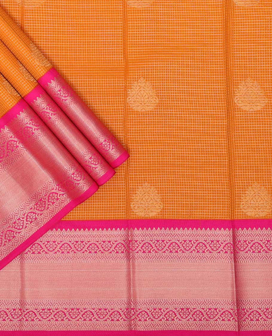 Orange checked, leaf design art silk pavadai material with contrast traditional zari design border & zari design blouse