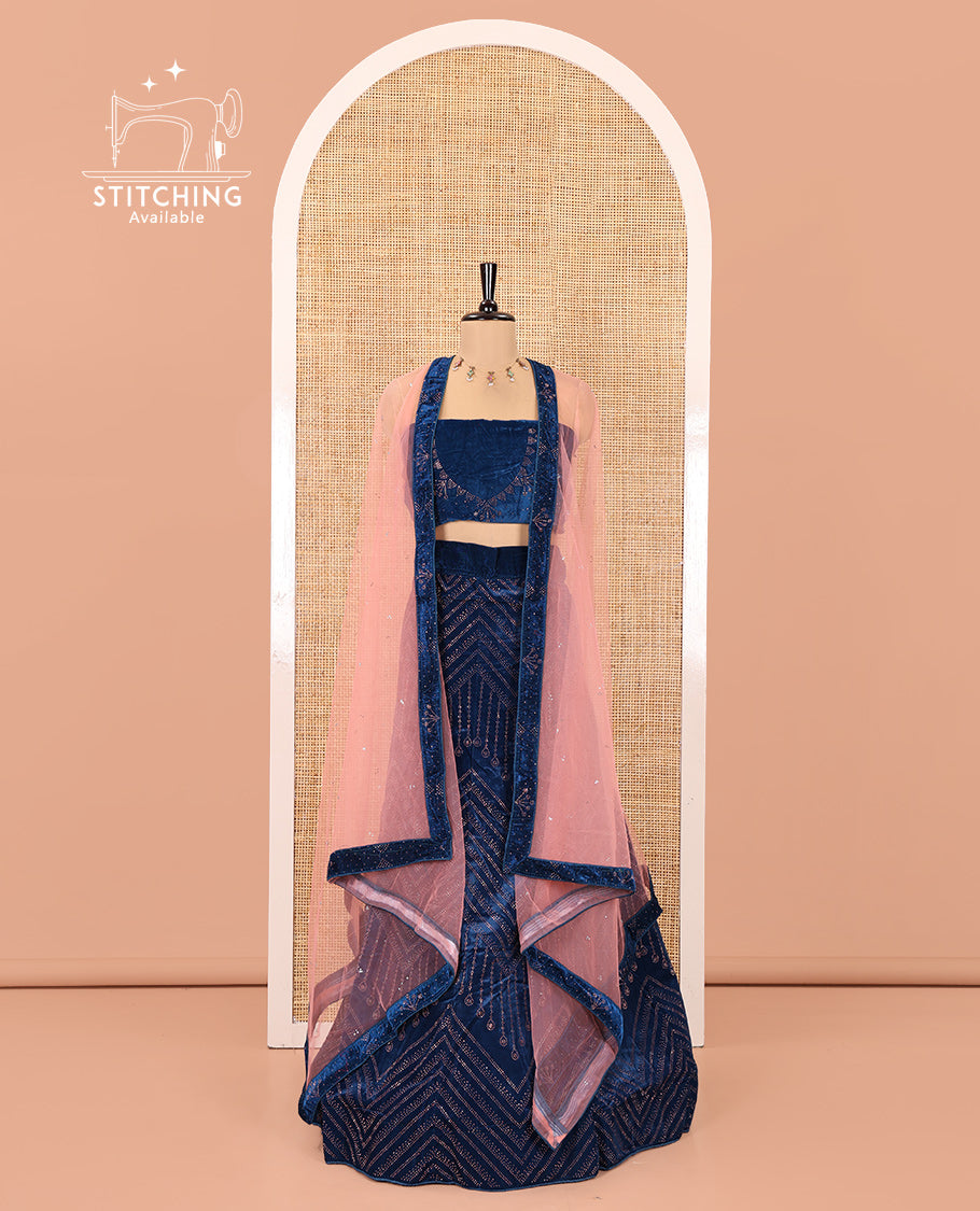 Blue Velvet Half-Saree, gleamed up with Swarovski Stonework Skirt, Matching Stonework Blouse, and Net Stonework Dhavani