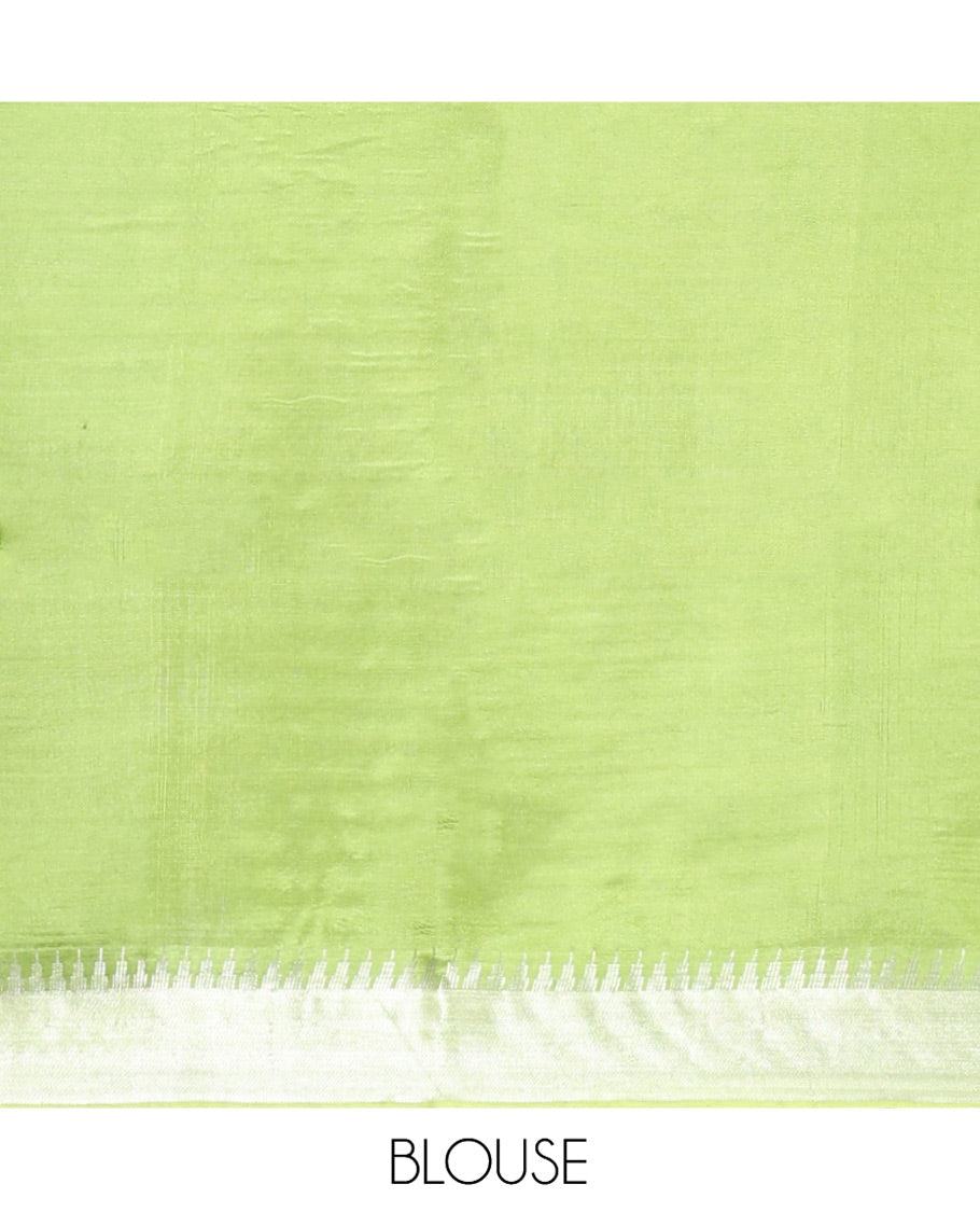 Light Green Banana Pith Saree, Lightly Embellished with Buttas All Over Its Body, Highlighted by a Zari Temple Border, Gleaming Zari Striped Pallu, and Paired with a Matching Blouse