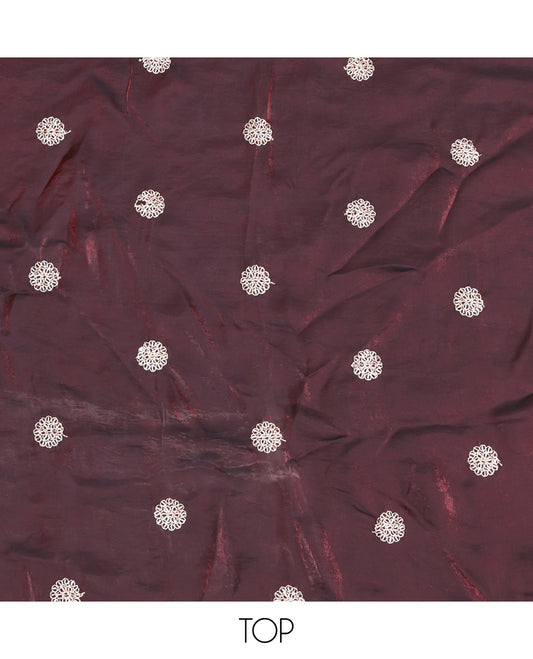 Maroon Material Churidar Set, Ornamented with Floral Embroidered Motif on Its Top, a Matching Bottom, and Scallop Embroidered Border Dupatta