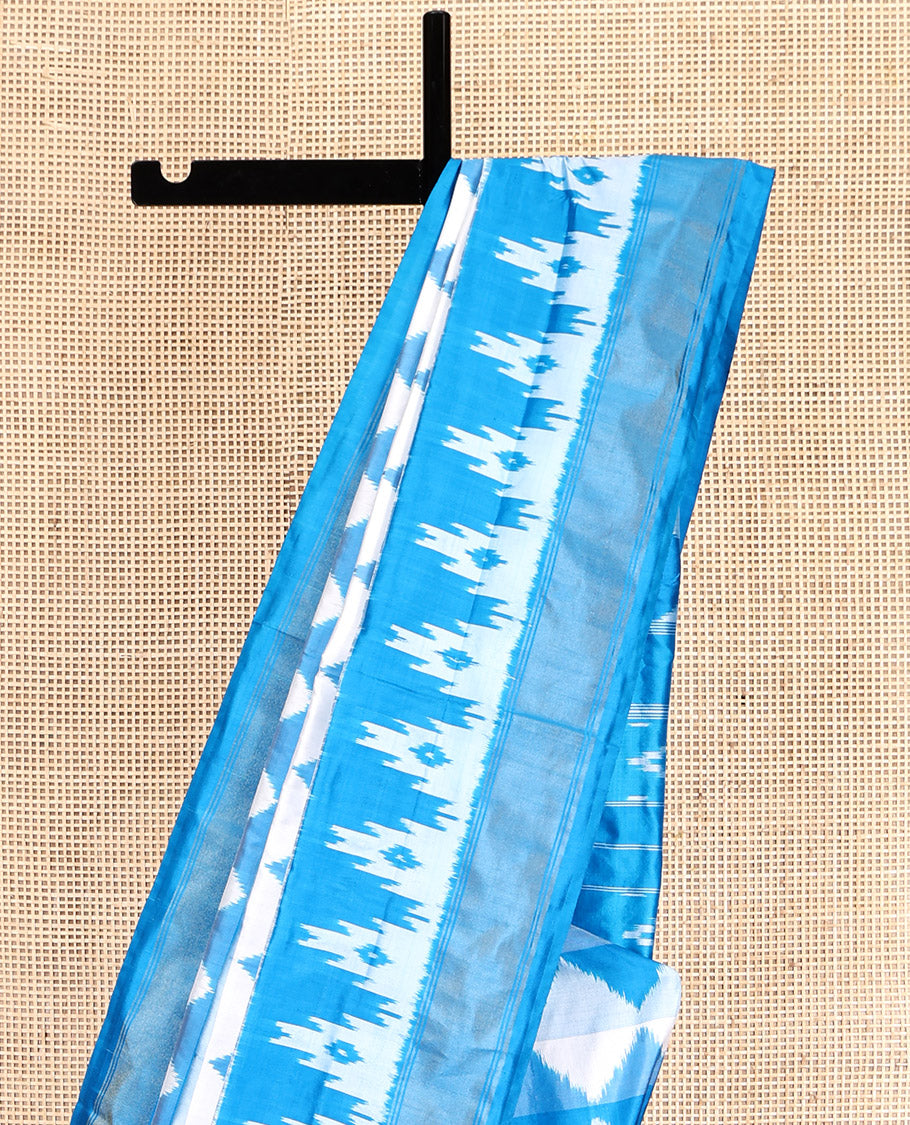 Blue Pochampally Ikat Silk Saree, Adorned with Triangle Motifs, Highlighted by a Self-Border, Ikat Jaal Pallu, and Matching Blouse