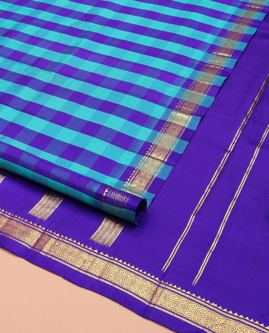 Multi-Color Kanchipuram Silk Saree, Decorated with a Checked Design on Its Body, Highlighted by a Zari One-Sided Border of Rekku, Banaras, and Jaal Designs, Pallu of Zari Designs, and Comes Without a Blouse