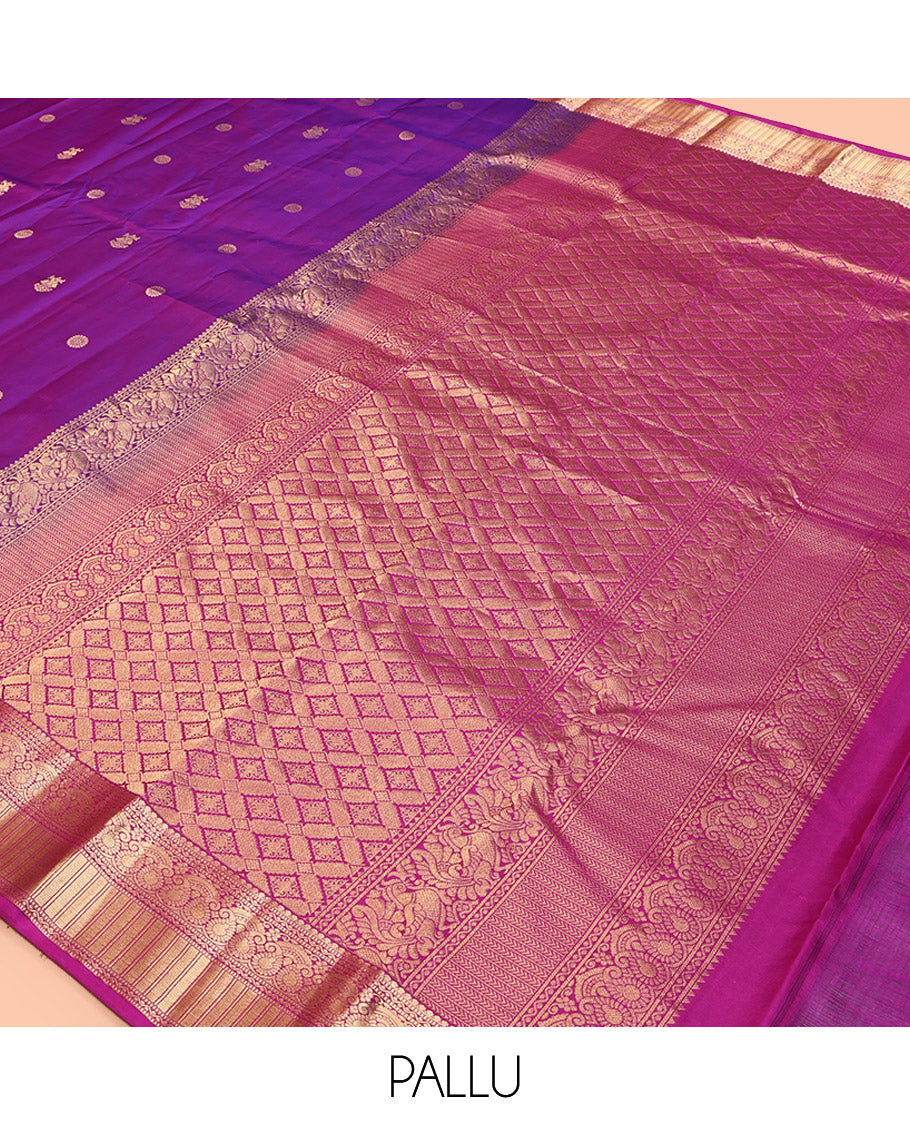 Purple Kanchipuram Silk Saree, Detailed with Chakram and Iruthalai Pakshi Buttas All Over Its Body, Complemented by a Contrast Border of Salngai, Muthu, Neli, Manga, and Kathir Designs, Intricately Designed Pallu, and Paired with a Contrast Blouse