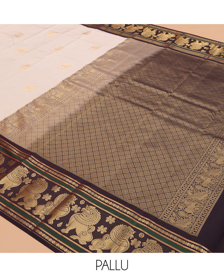 Cream Vasundhara Lite Silk Mix Saree, Woven with Yaali Buttas, a Contrast Singam Border, Grand Jaal Pallu, and a Contrast Blouse