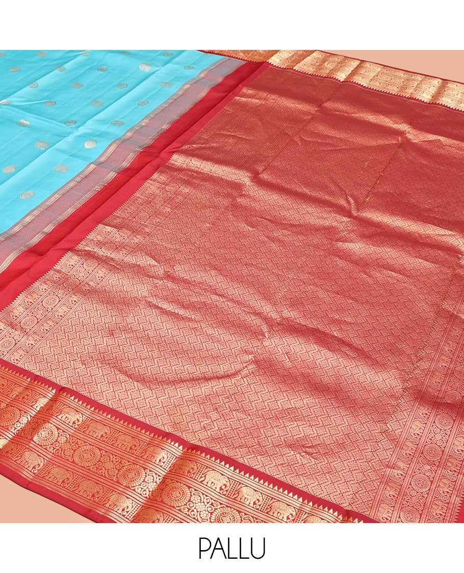 Blue Vasundhara Silk Saree, Embellished with Mayil and Yaanai Buttas Across Its Body, Complemented by a Contrast Korvai Border of Rekku, Banaras, Yaanai, and Chakram Designs, Gleaming Jaal Pallu, and Paired with a Contrast Blouse