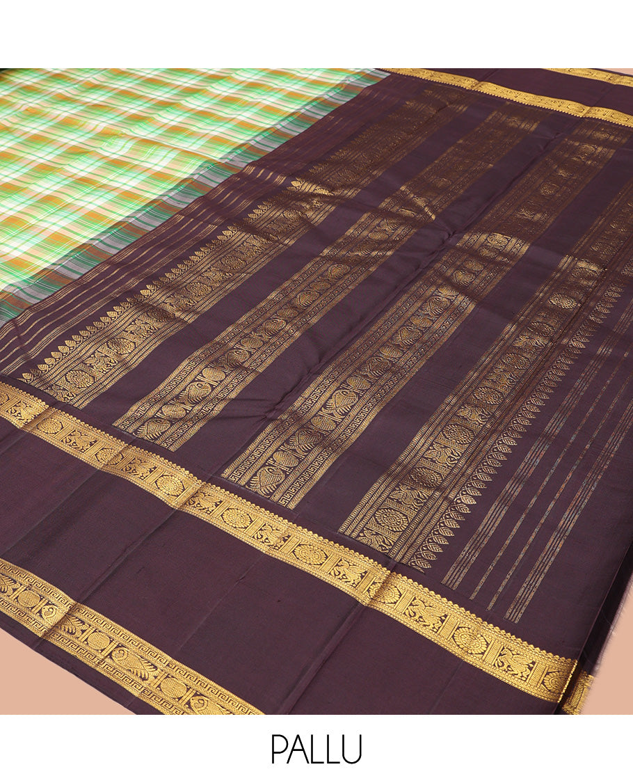 Green Checked Kanchipuram Silk Saree, a Contrast Rettai Pettu Temple Border of Chakram and Kuthirai Designs, Traditional Pallu, and Contrast Blouse