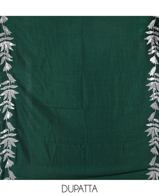 Pista Green Material Churidar Set, Detailed with Floral Motifs Sequins-Thread Embroidered on Its Vichitra Silk Top, Comes with a Contrast Santoon Bottom, and Paired with a Vichitra Silk Floral Embroidered Scallop Dupatta