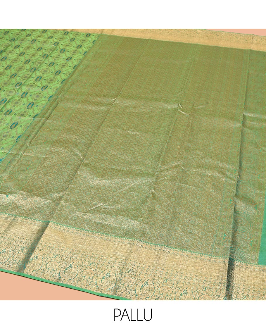 Green Kanchipuram Wedding Silk Saree, Elegantly Highlighted with Meenakari Jacquard on Its Body, Highlighted by a Zari Border of Jaal, and Arumbu Manga Designs, Grand Jaal Pallu, and Paired with a Matching Blouse