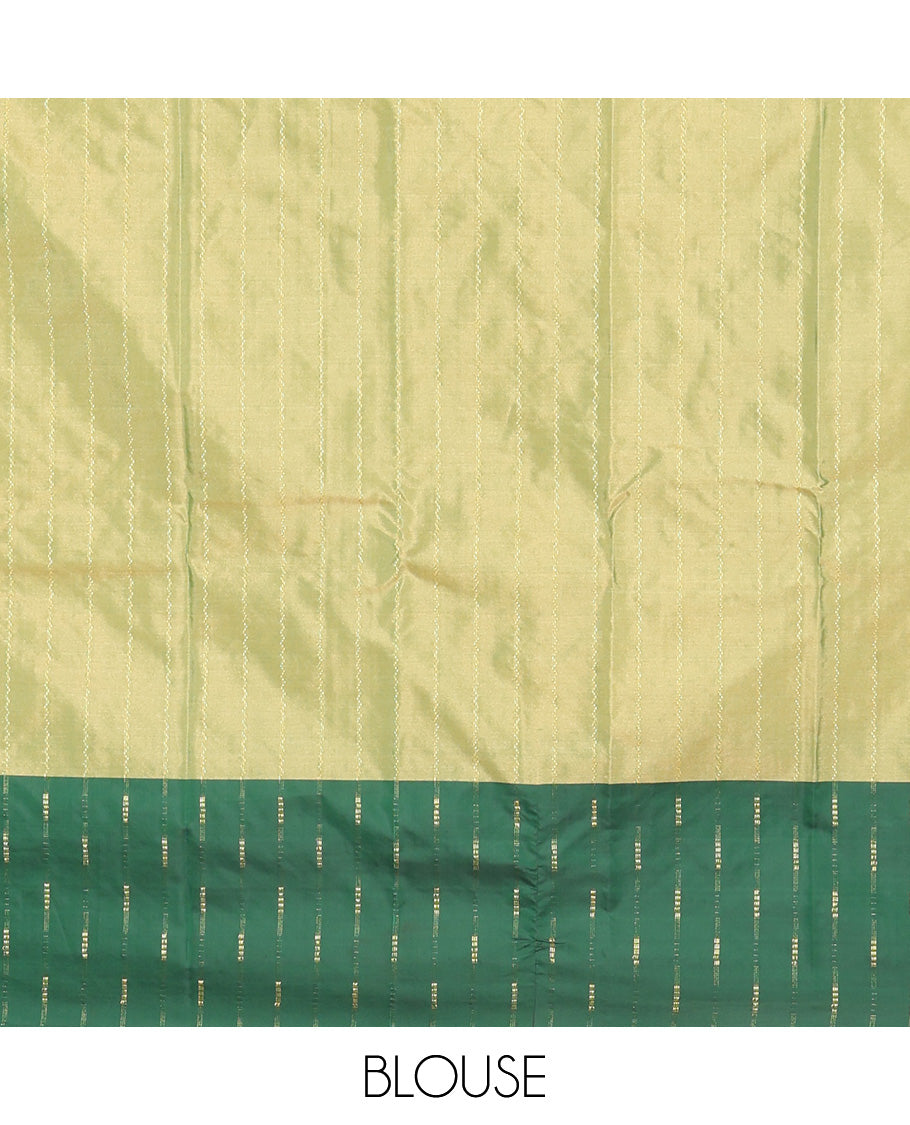 Green Aarani Silk Saree, Lightly Embellished with Zig-Zag Stripes All Over Its Body, Complemented by a Contrast Zari Buttas Border, Pallu of Stripes, and Paired with a Matching Blouse