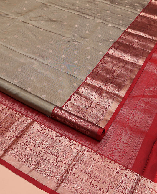 Grey Vasundhara Silk Saree, Sparsely Woven with Zari Buttas All Over Its Body, Complemented by a Contrast Border of Yaali, Yaanai, Neli, Banaras, Kathir, and Kamalam Designs, Grand Pallu, and Paired with a Contrast Blouse