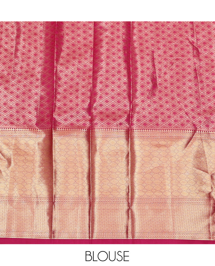 Gold Art Silk Material Half Saree, Ornamented with Jacquard Skirt, a Contrast Meenakari Border, Contrast Blouse, and an Intricate Dhavani