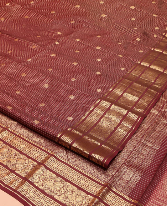 Maroon Vasundhara Lite Silk Mix Saree, Finely Crafted with Mayil-Chakram Butta Enclosed Checks on Its Body, Highlighted by a Zari Border of Ara Bogudi, Banaras, and Round Mayil Designs, Intricate Pallu, and Paired with a Matching Blouse