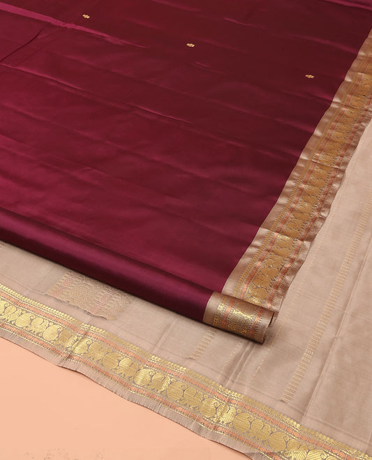 Maroon Kanchipuram Silk Saree Embellished with Zari Buttas, Complemented by Contrast Border of Thilakam Mokku, Muthu, Rudraksham, Manga, and Mayil Designs, Subtly Sparkled Pallu, and Paired with a Contrast Blouse
